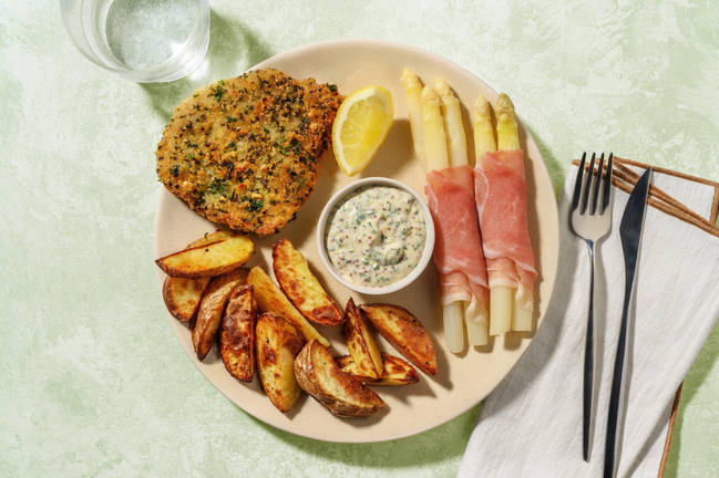 Weißer Spargel in Prosciutto mit Kräuterschnitzel