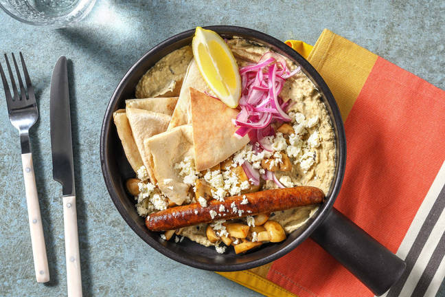 Hummusbowl met rundermerguez en champignons