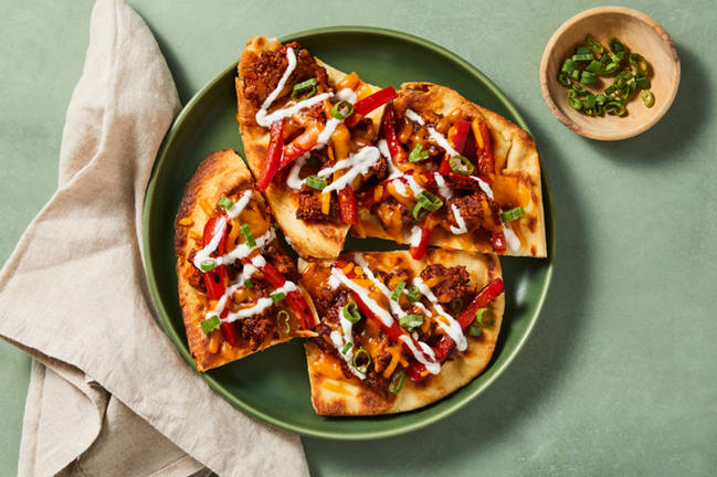 Pains plats au poulet style fajitas