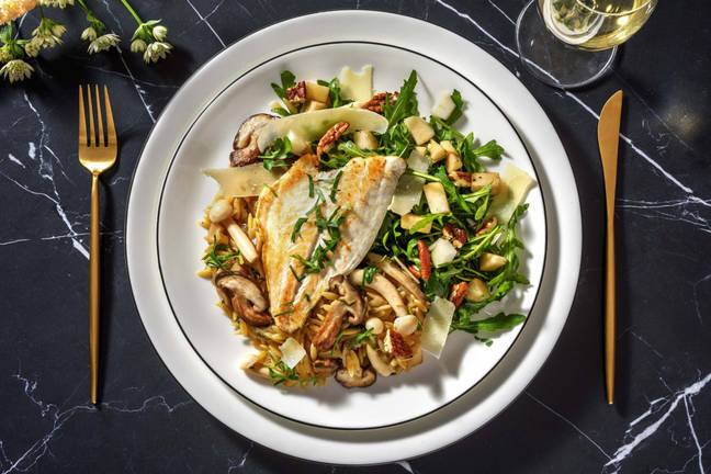 Truffelorzo met doradefilet en paddenstoelen