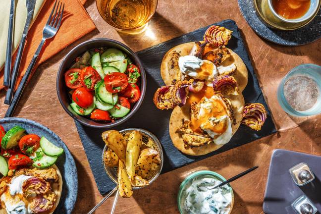 Tandoori Style Chicken on Naans with Raita and Mango Chutney