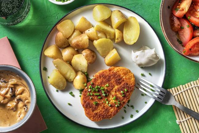 Vegetarische schnitzel met champignonroomsaus