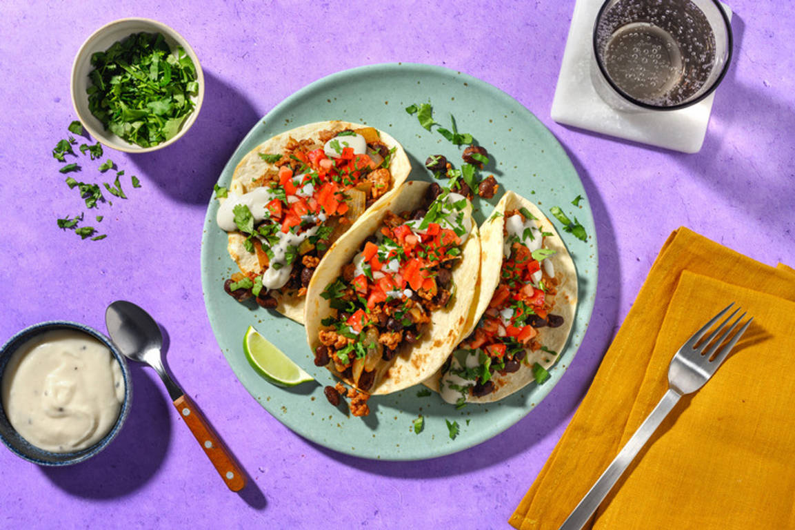 ¡Fiesta del taco! Cerdo con frijoles y cilantro
