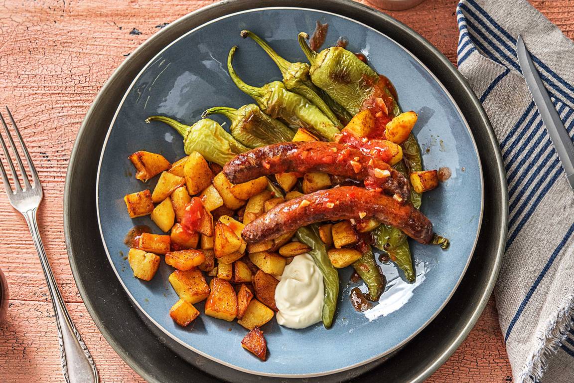 Patatas bravas met rundermerguezworstjes