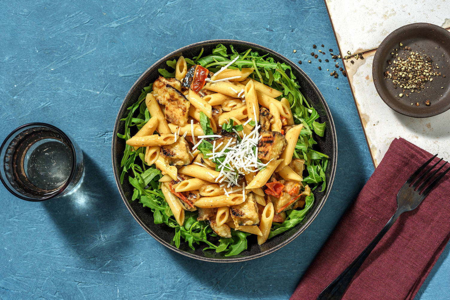 Romige penne met aubergine en Parmigiano Reggiano