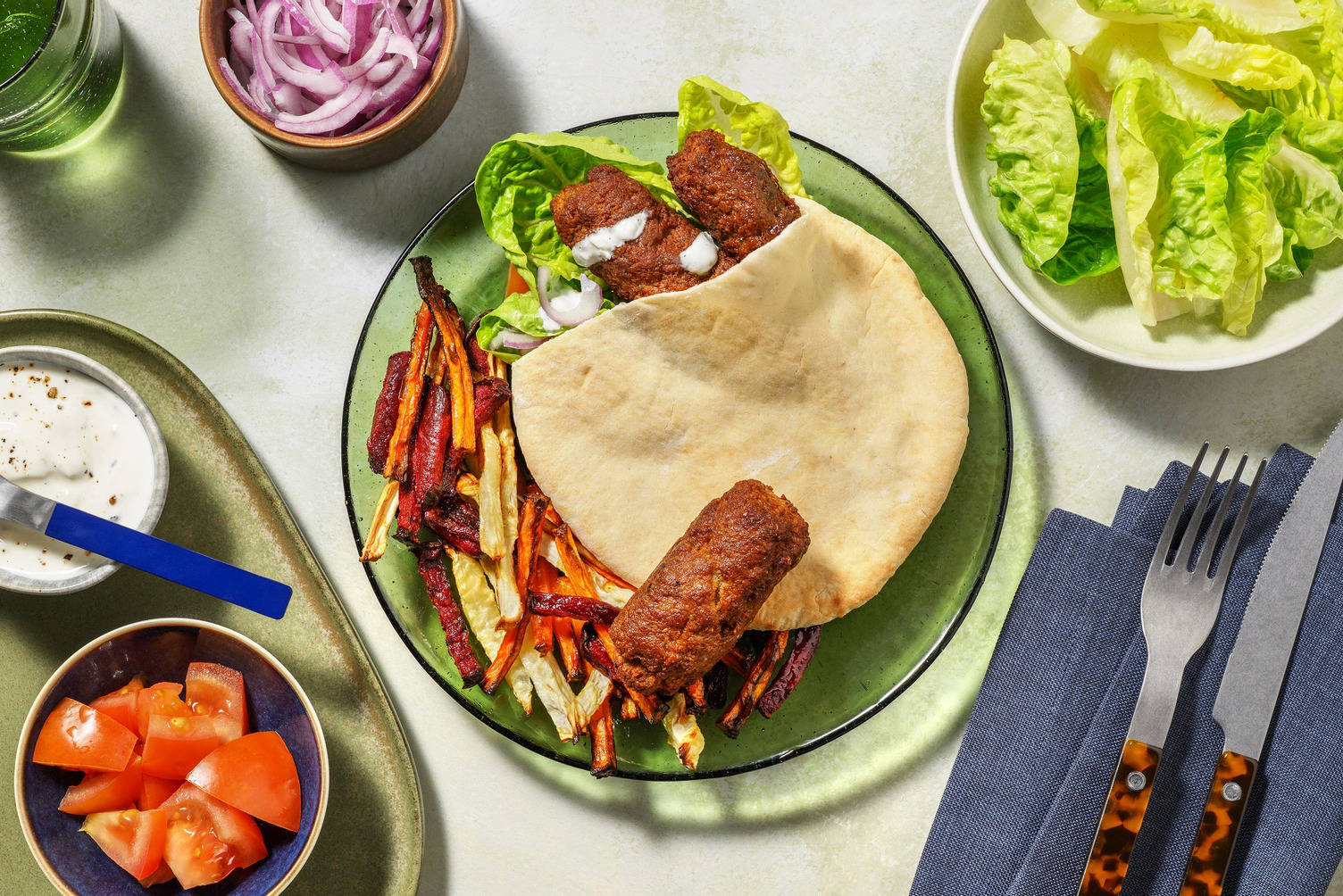 Svinekjøttkofta i pita med bacon