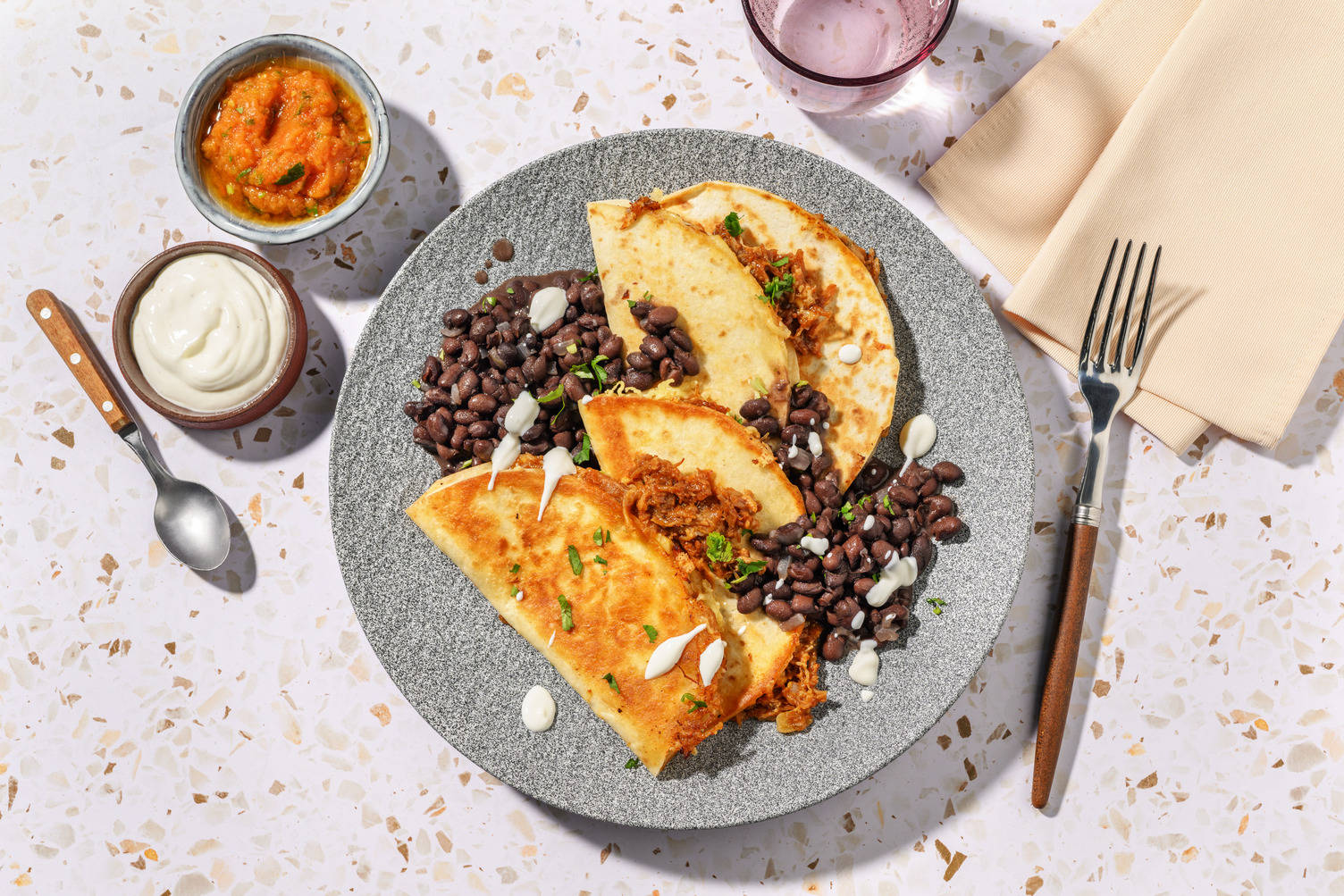 Queso-Tacos mit doppelt Pulled Pork