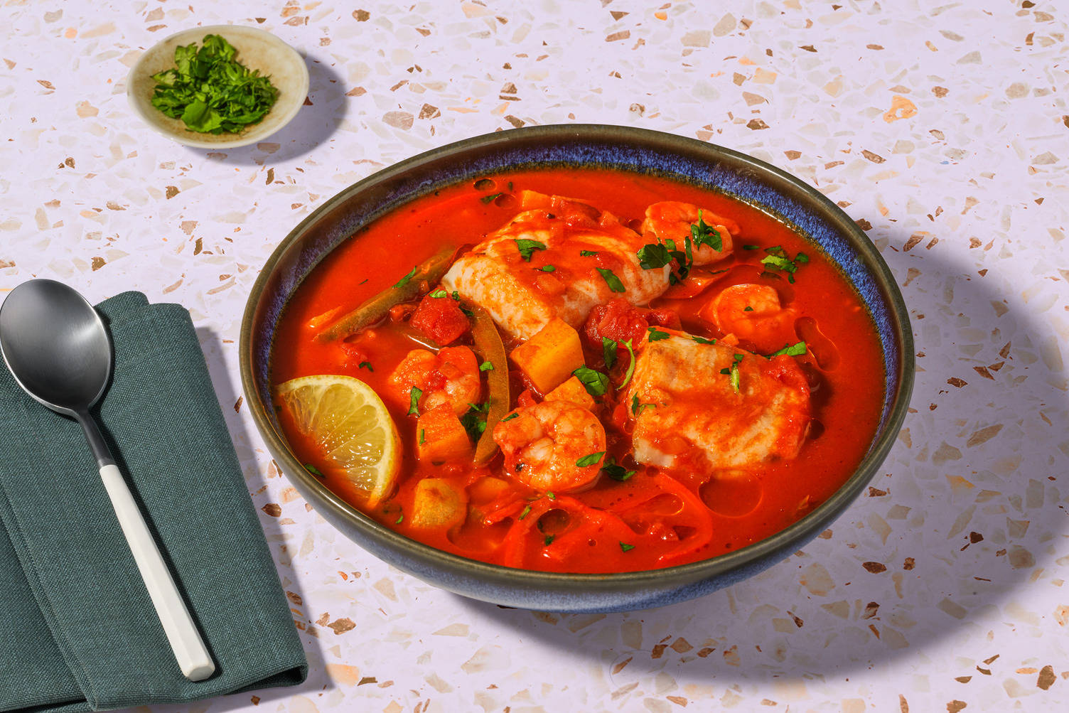 Mijoté de merlu & crevettes à la portugaise