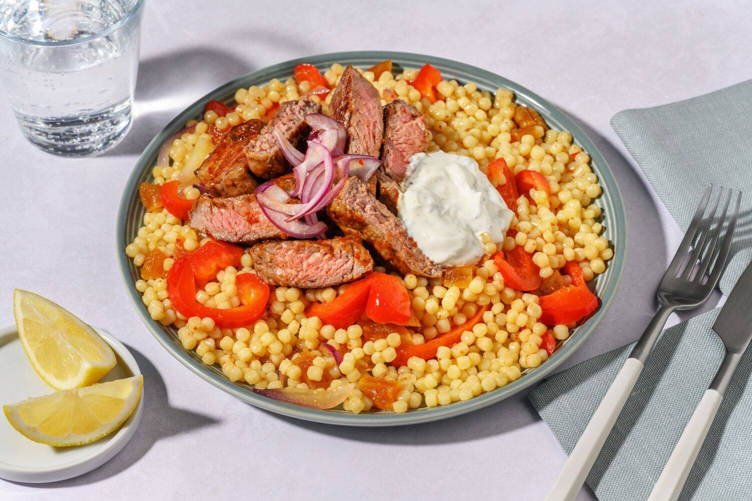 Harissa Lamb Steaks and Pearl Couscous Salad