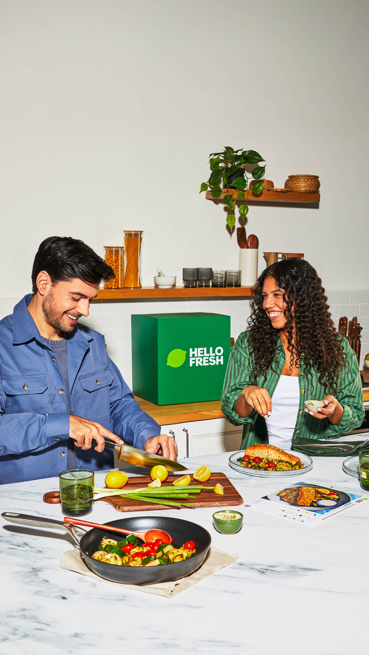 HelloFresh meal ingredients and cooking utensils arranged for meal preparation
