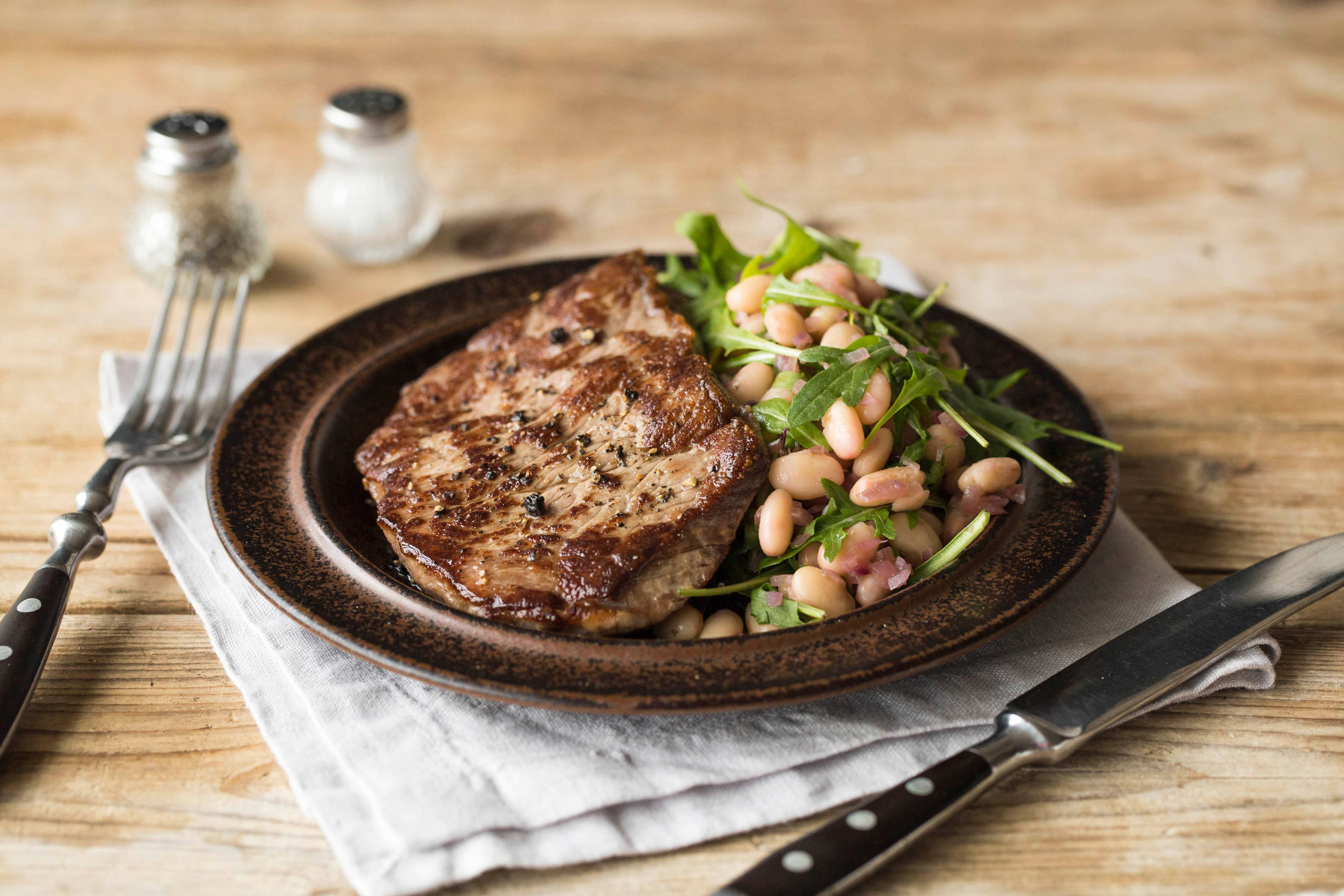 Grilled Porterhouse Steak with Italian Cannellini & Rocket