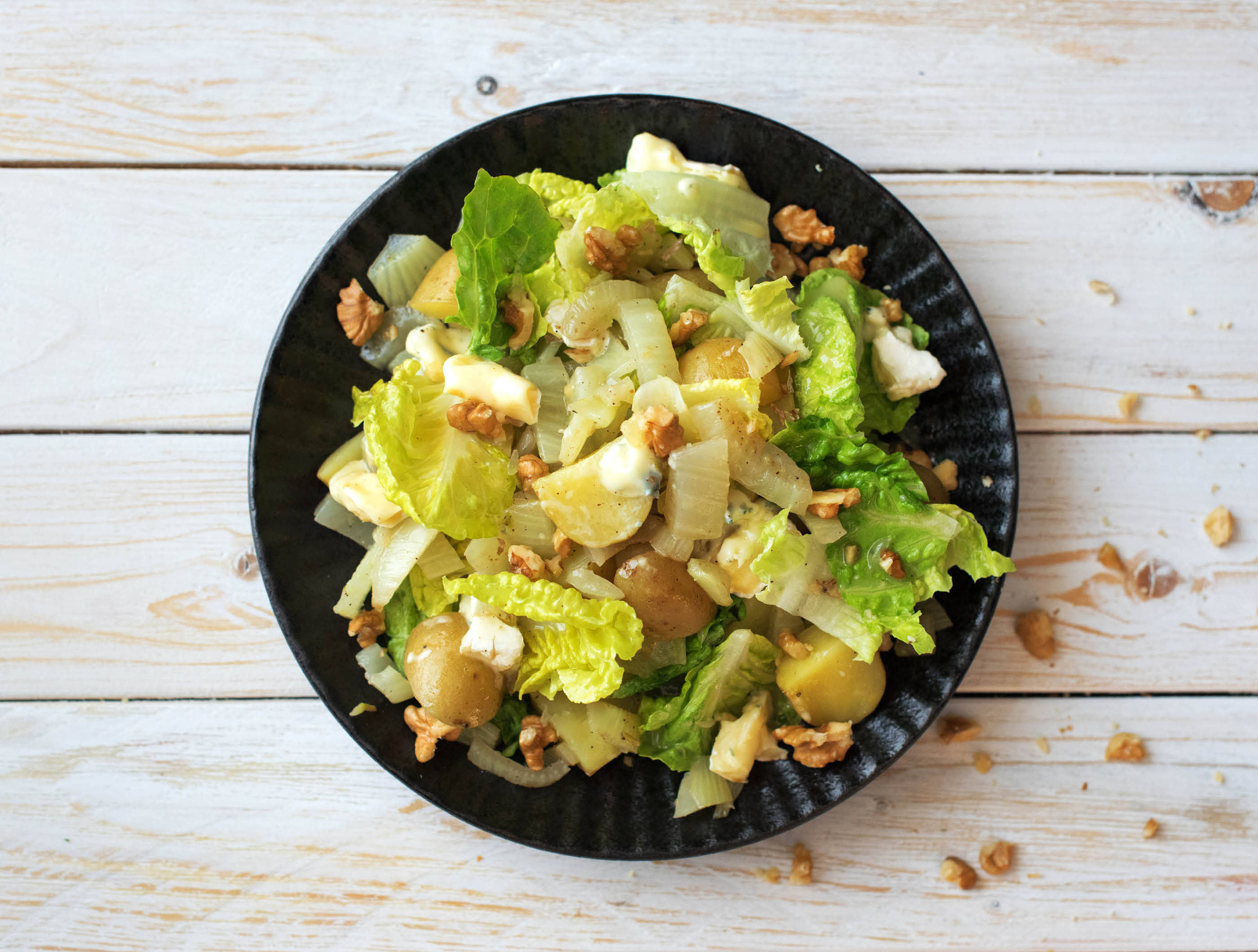 Pommes de terre grelot avec fenouil, danablu, noix dans une vinaigrette au citron