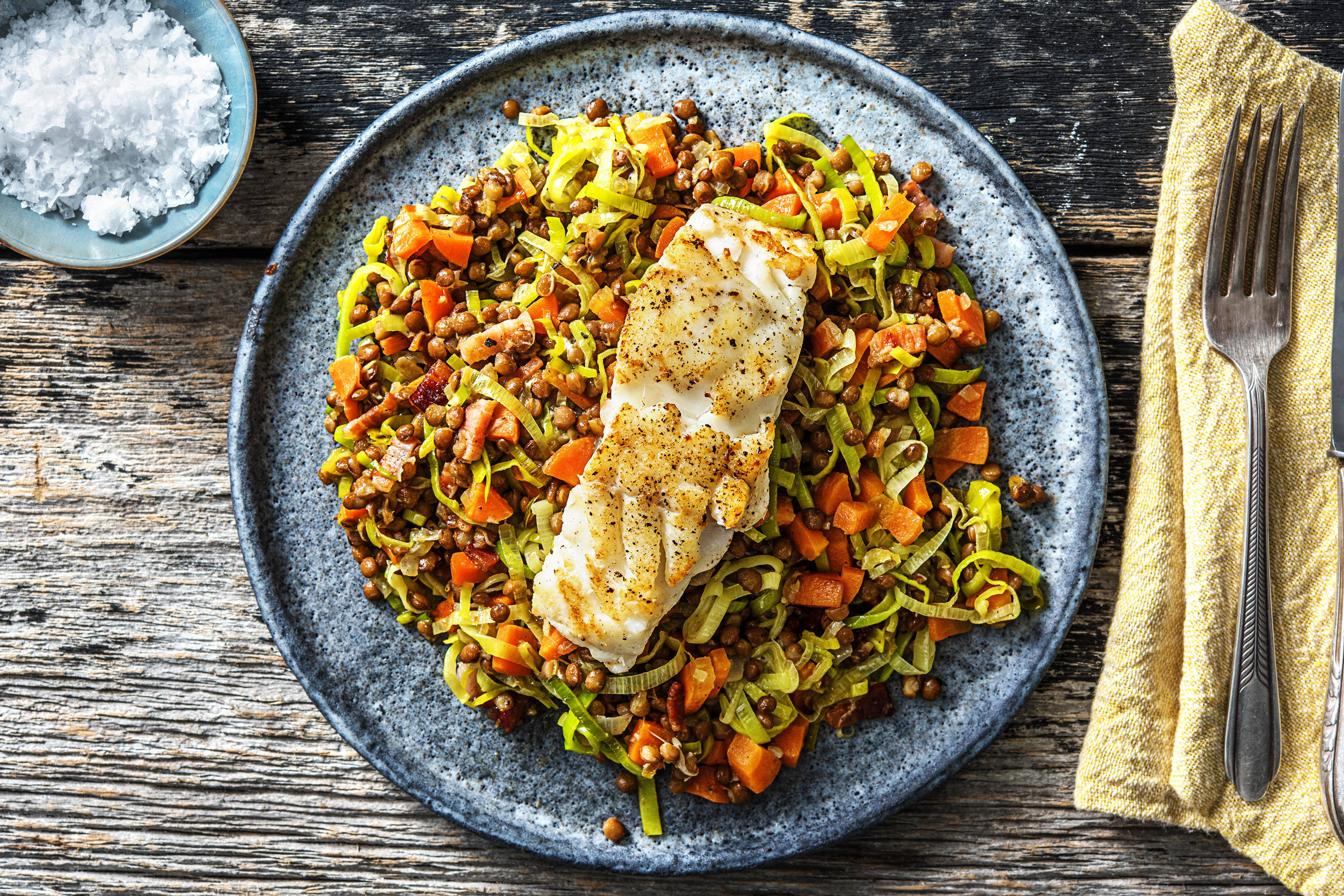 Schelvisfilet met linzen en spekjes