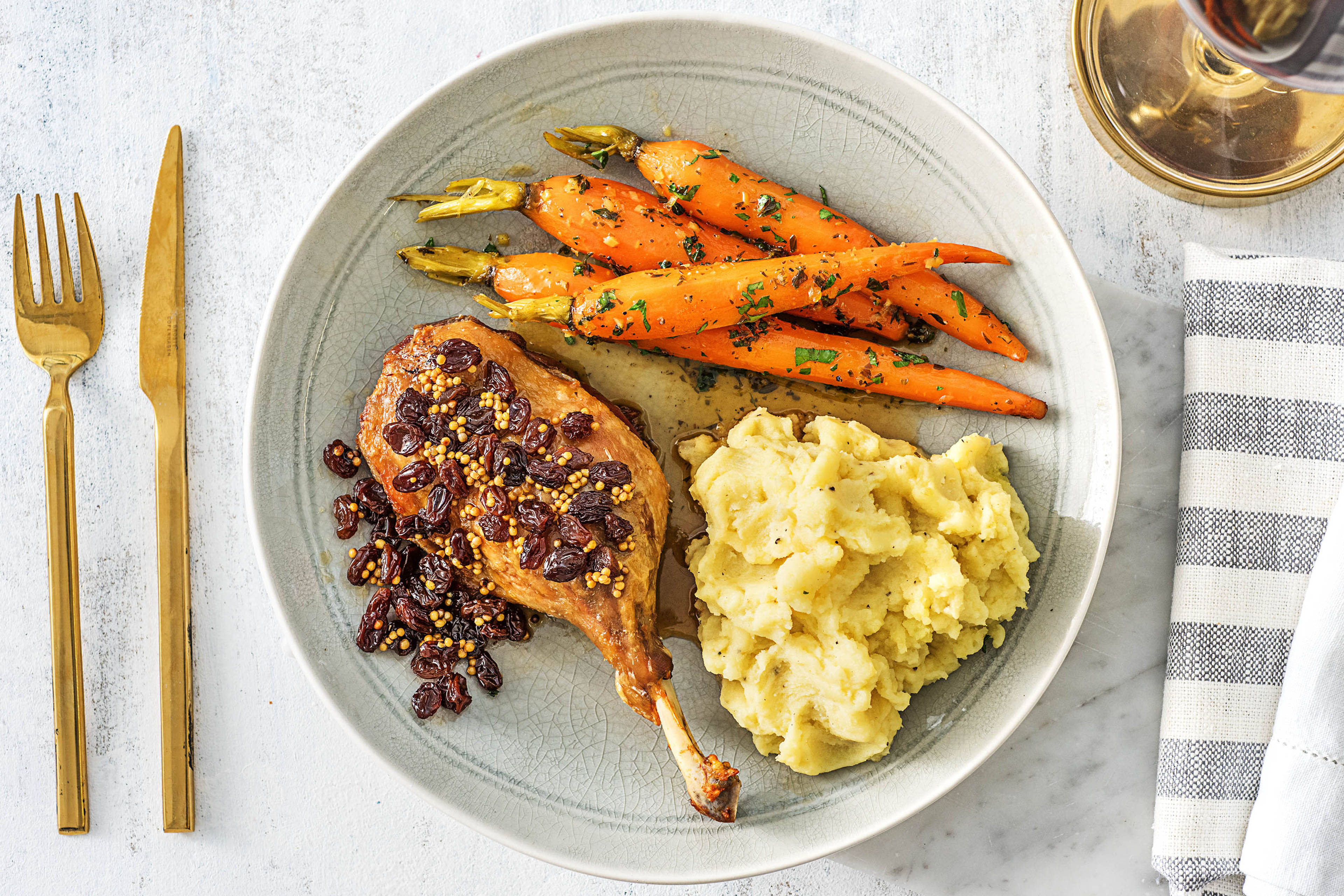 Cuisse de canard confite et raisins secs