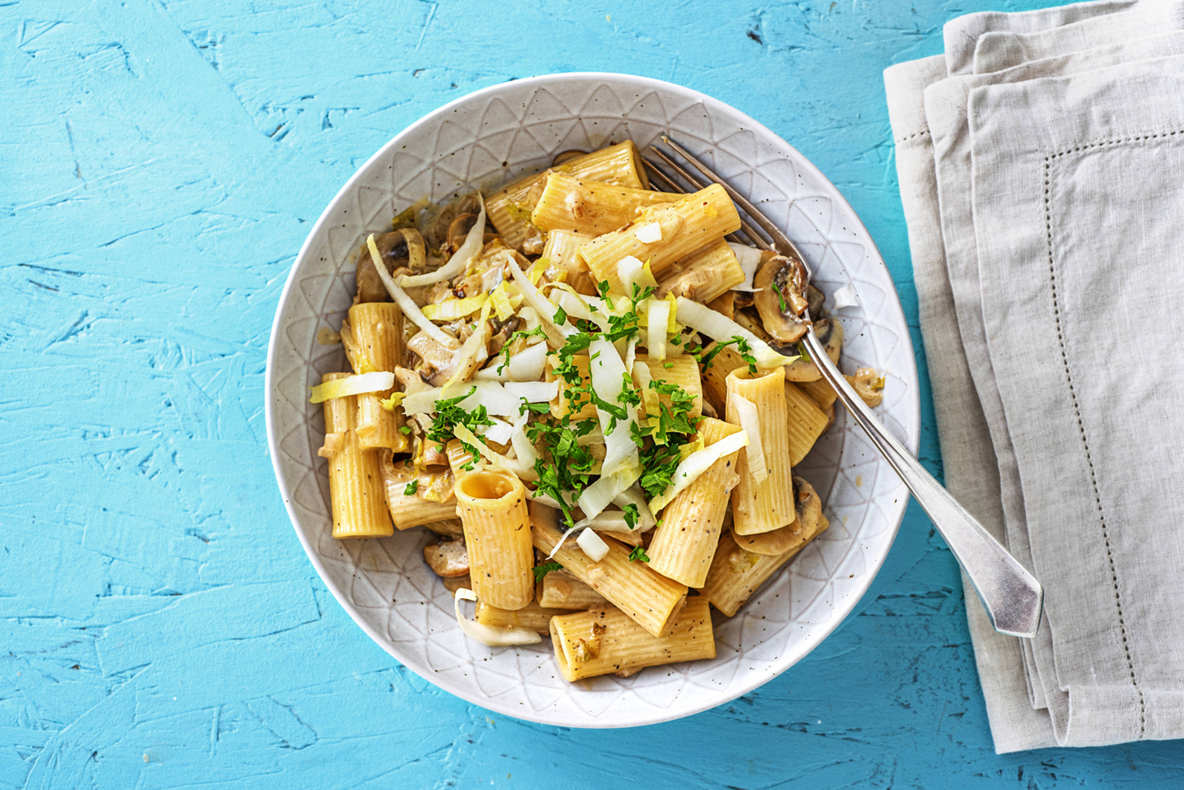 Penne aux endives et sauce crémeuse aux champignons