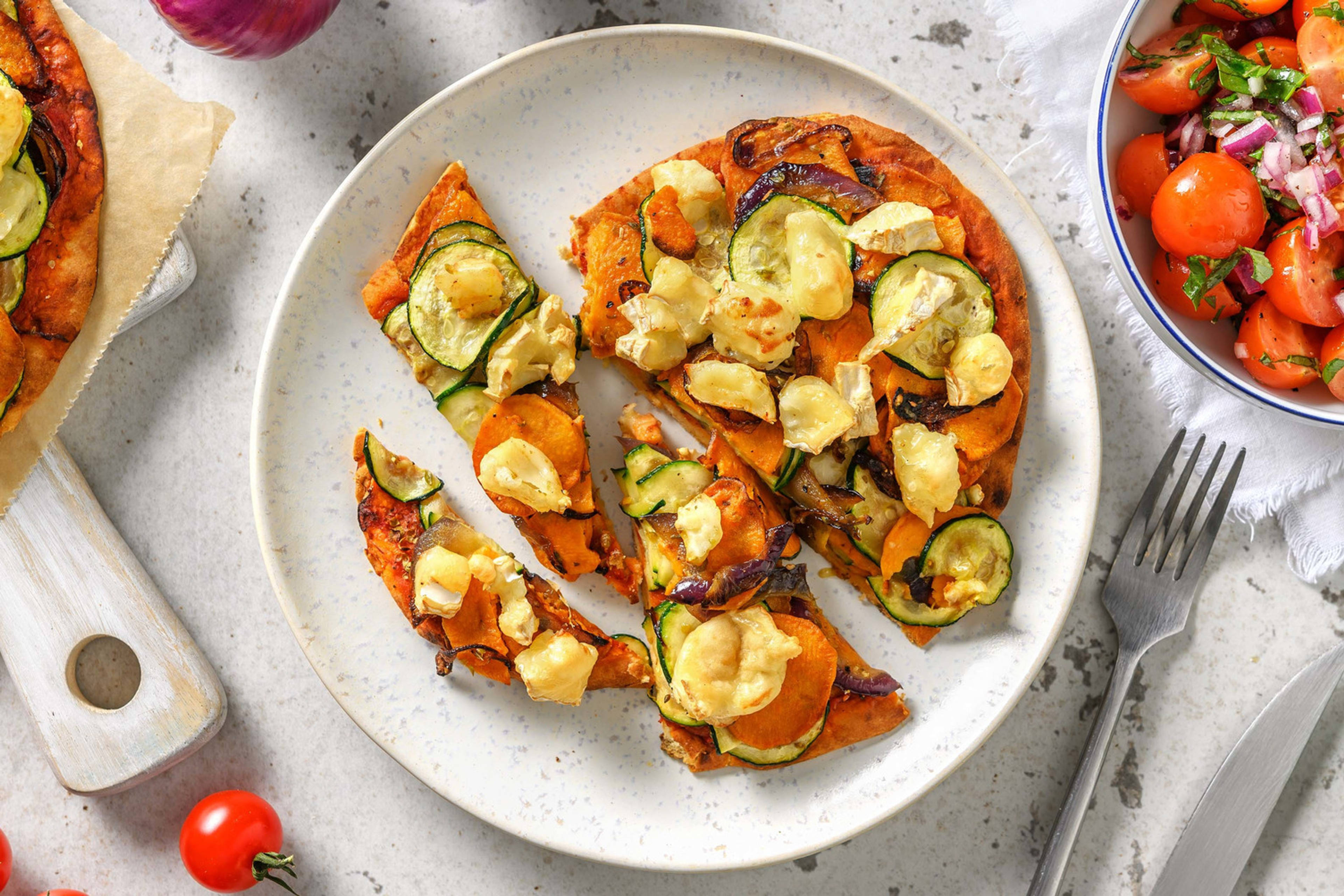 Naanpizza met geitenkaas en groenten