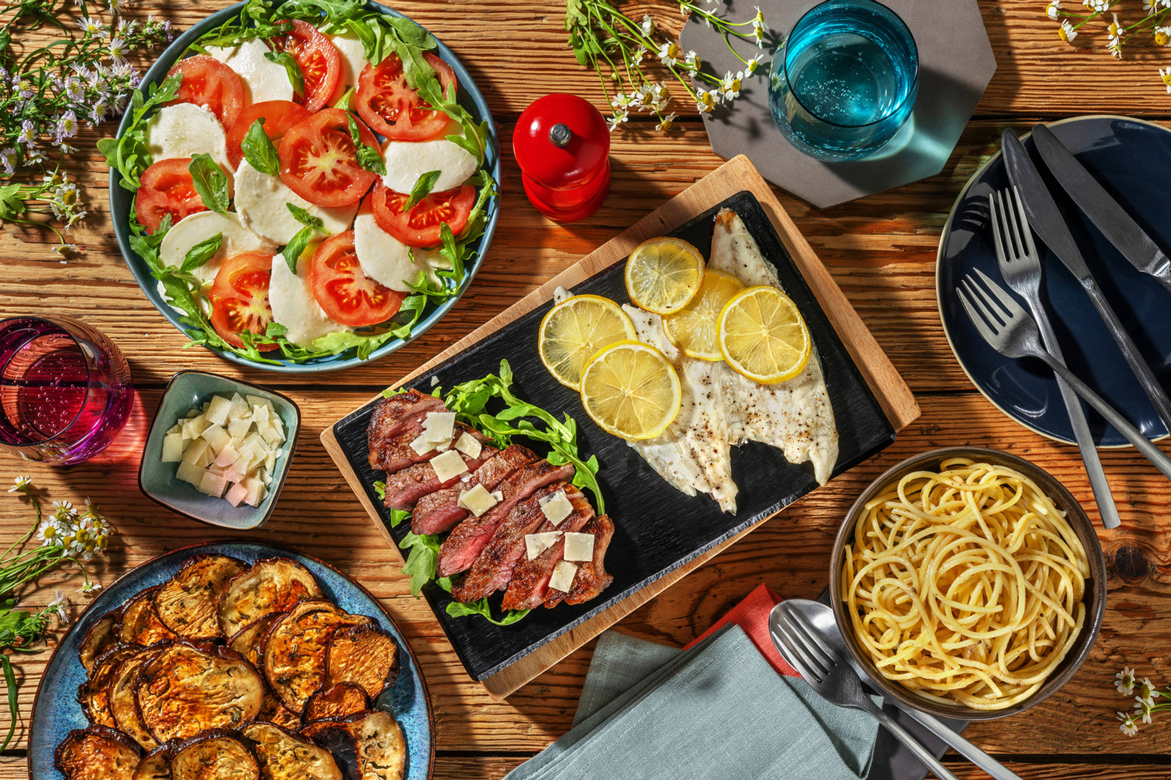 Festin à l'italienne avec dorade au four et tagliata di manzo
