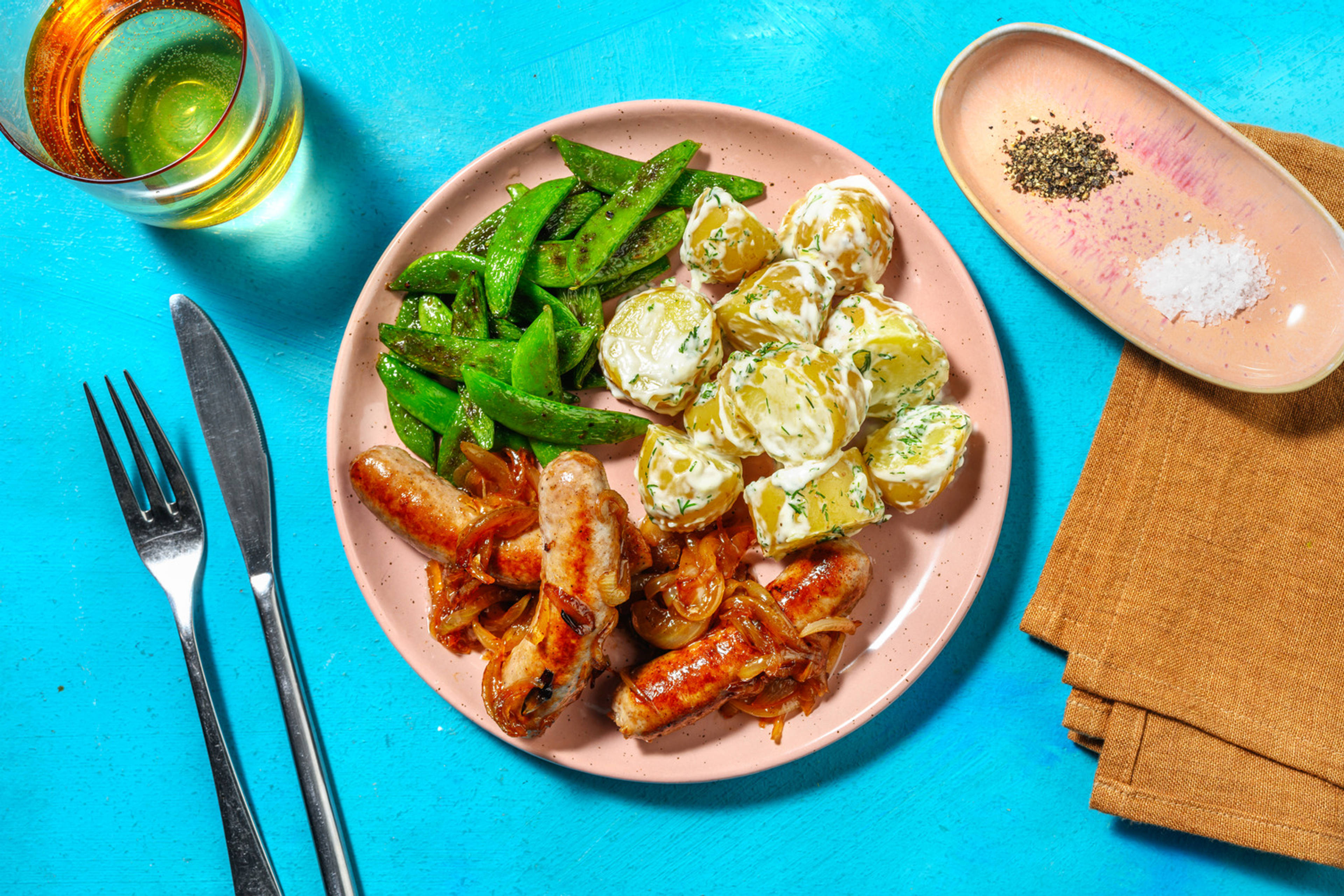Salchichas encebolladas