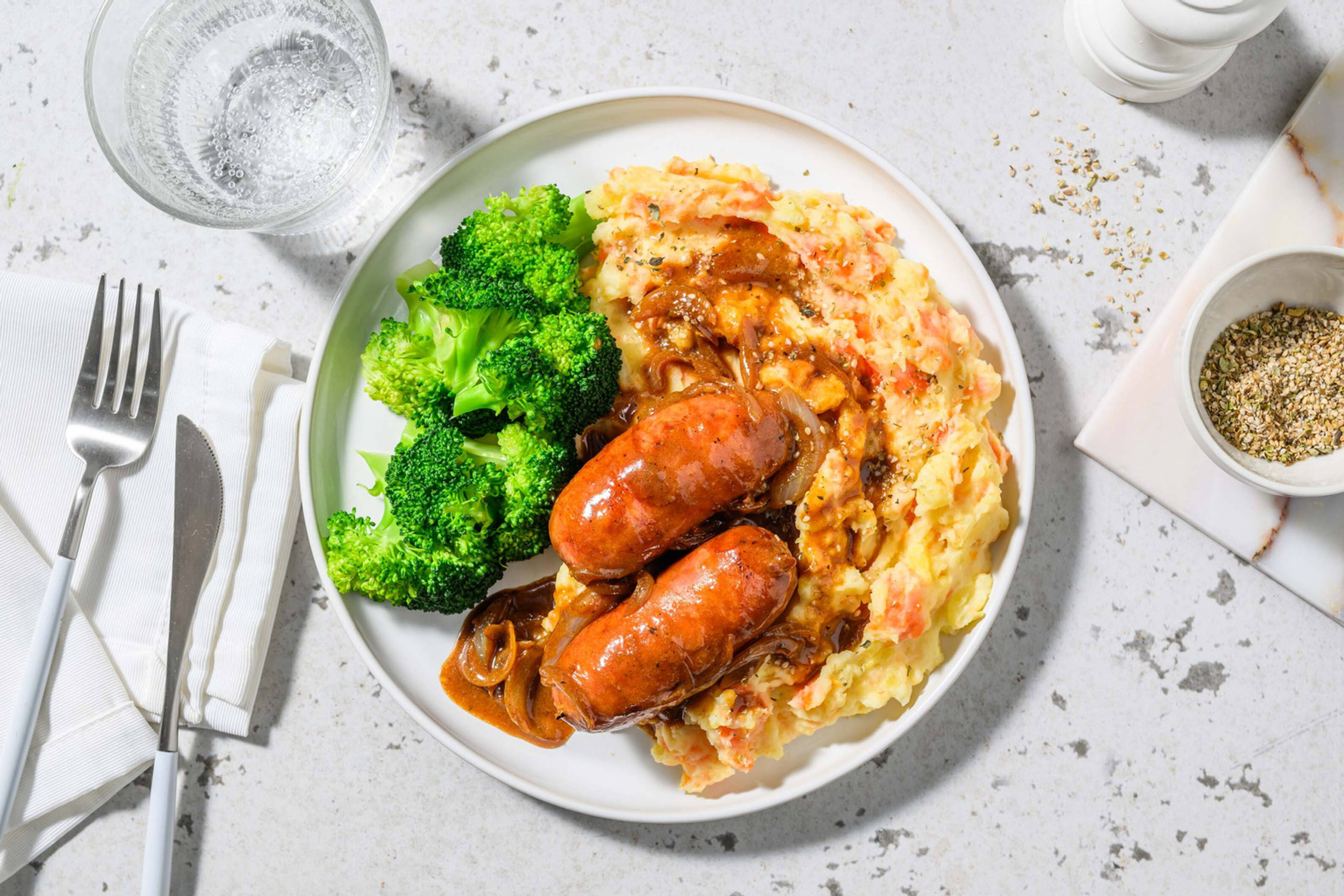 Saucisses de poulet et purée de carotte