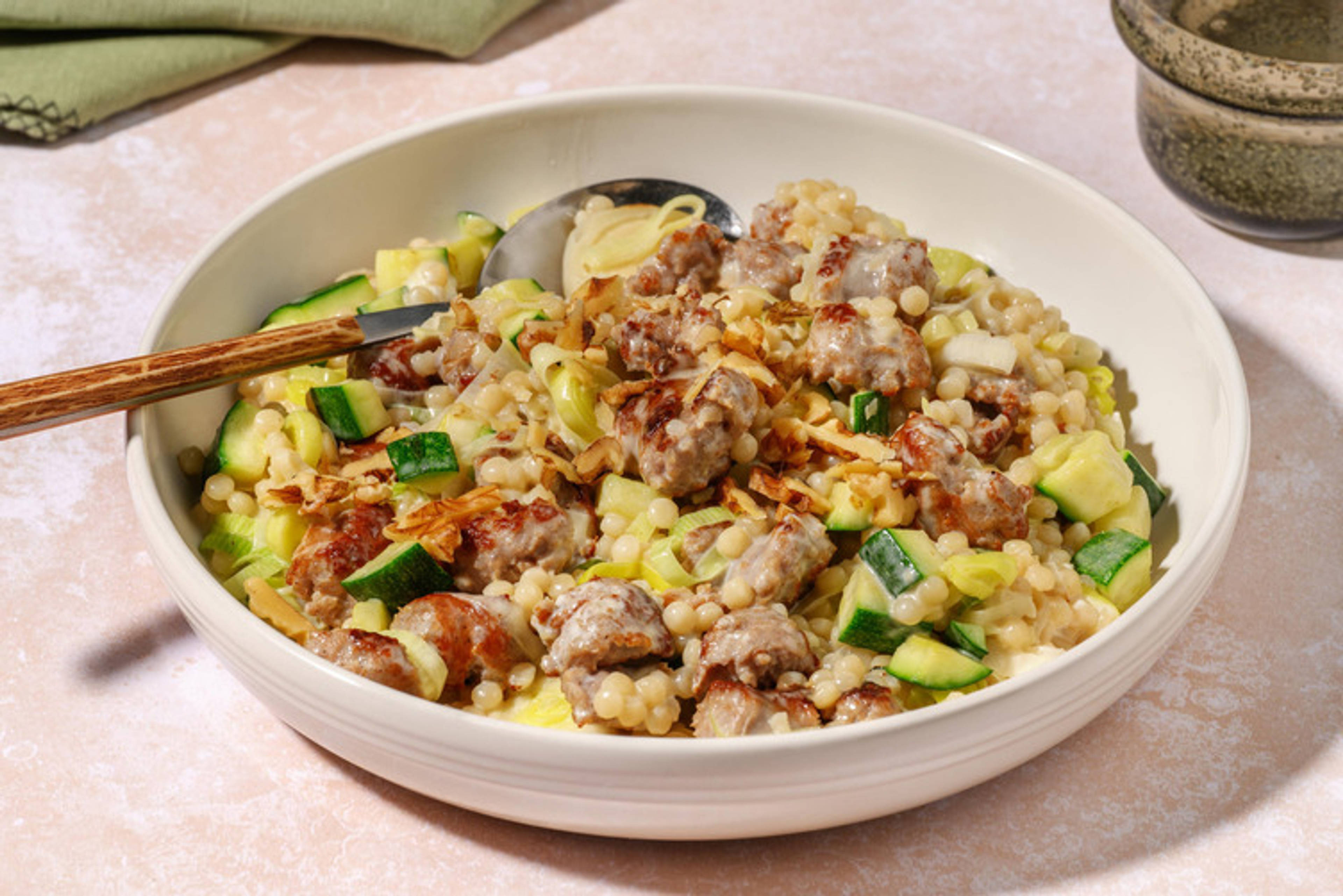 Couscous cremoso alla salsiccia e stracchino