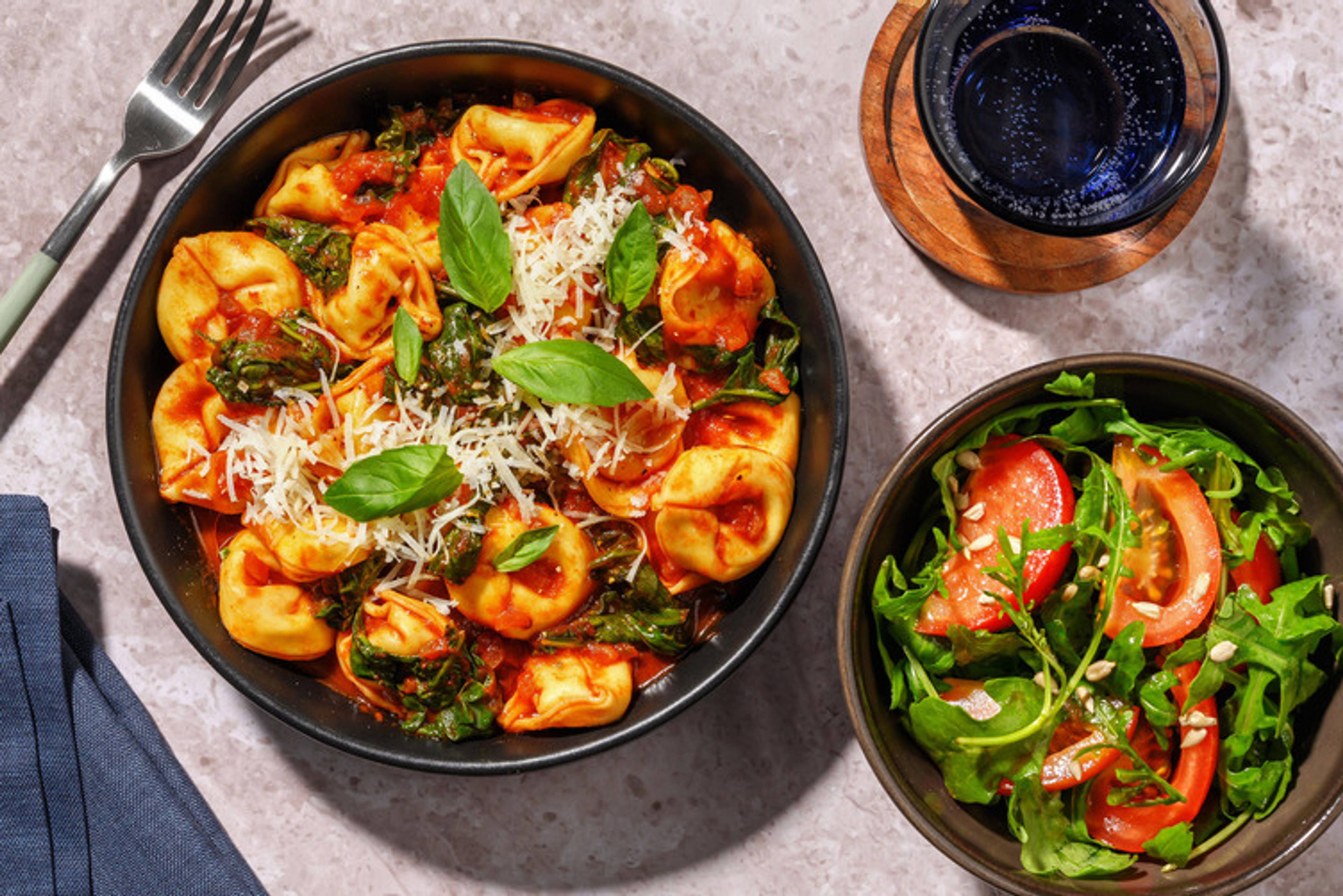 Tortelloni in tomatensaus met Parmigiano Reggiano