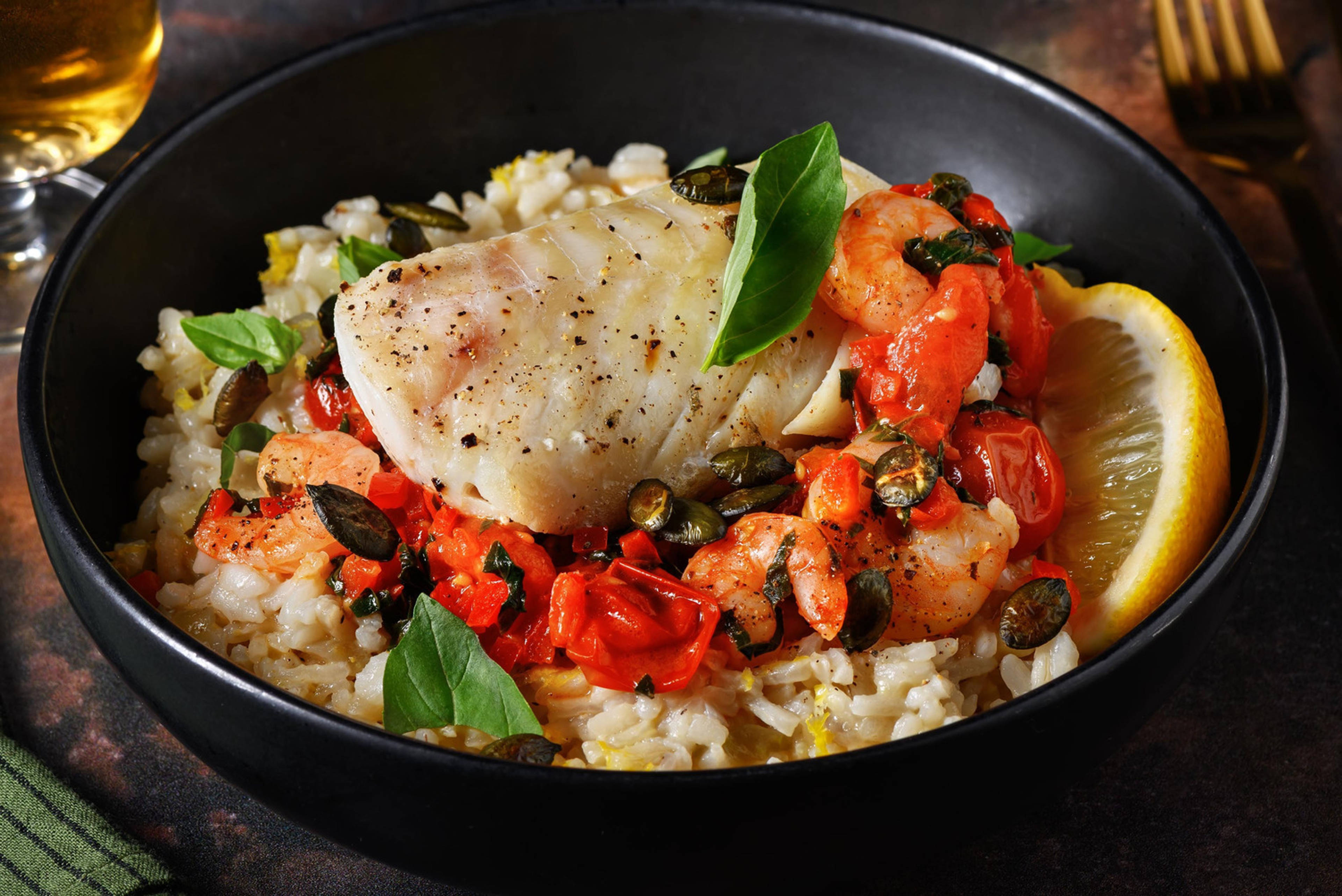 Kabeljauwfilet met garnalen in knoflookboter en Parmigiano Reggiano