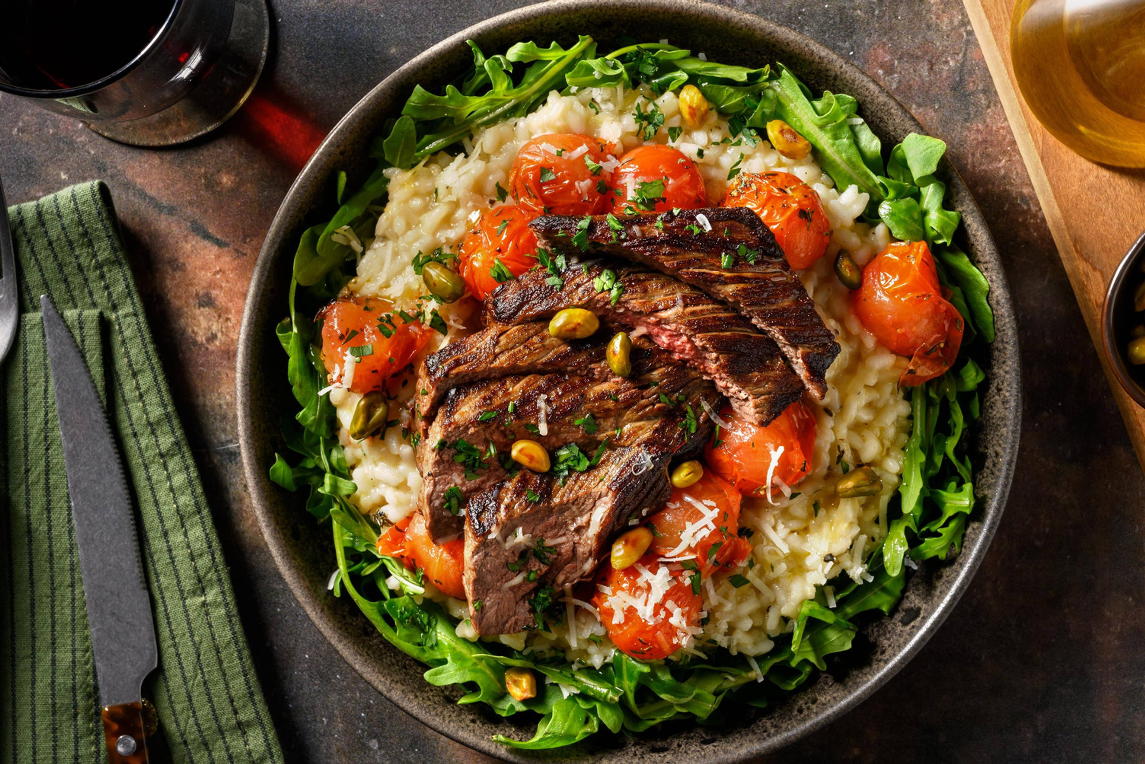 Entrecote met Parmigiano-risotto en rucola