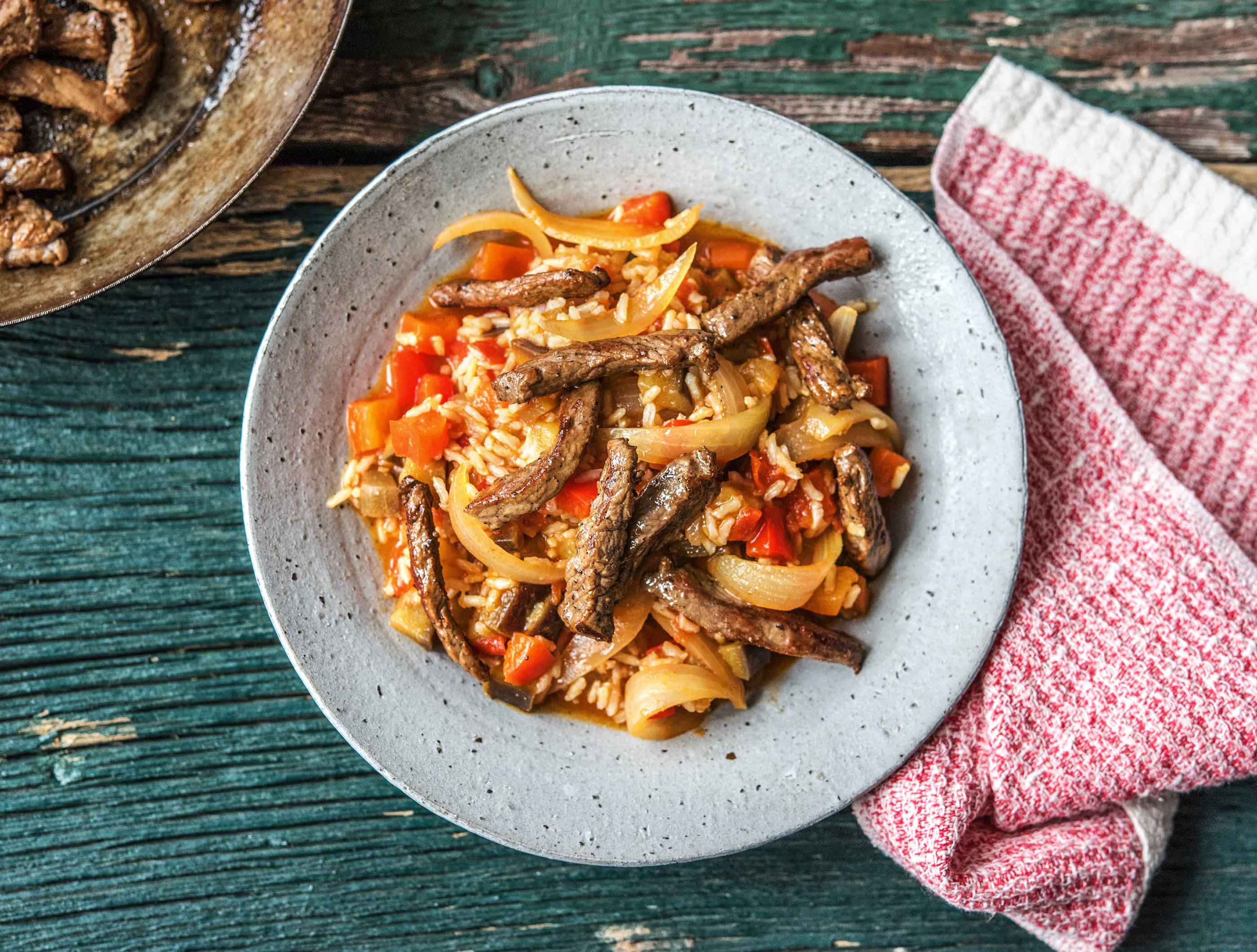 Biefstukpuntjes met aubergine en zilvervliesrijst