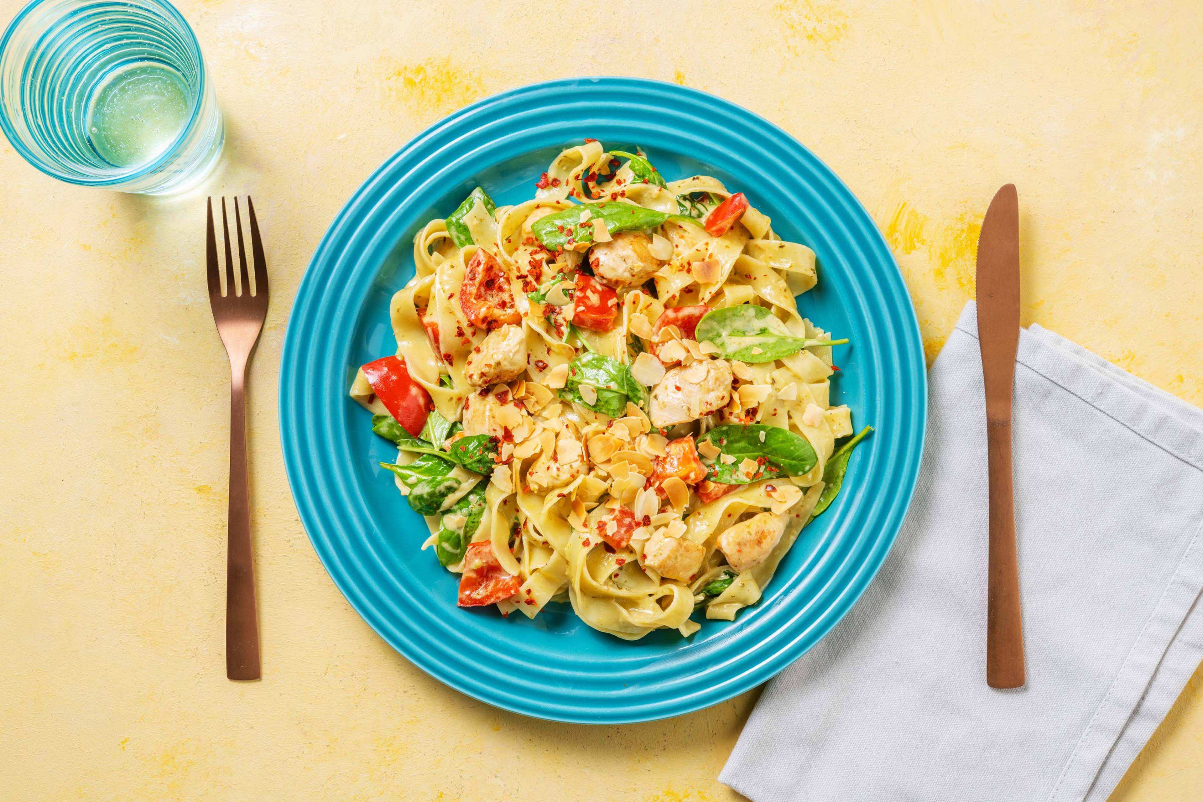 Cheesy Chicken Pesto Fettuccine with Flaked Almonds
