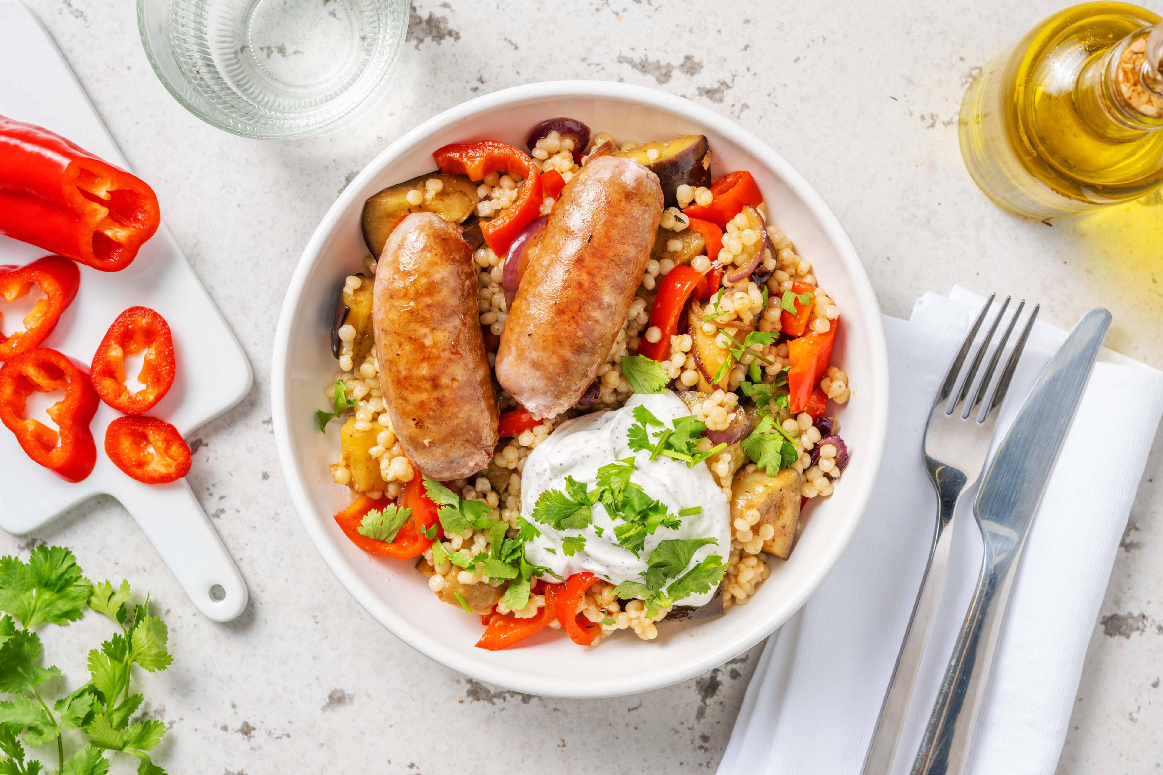 Kipworstjes met parelcouscous