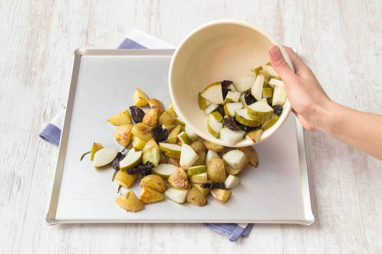 Add prunes and pears to the potatoes
