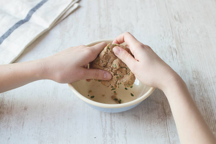 Gradually form into a soft dough