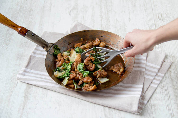 Stir fry until bok choy wilts
