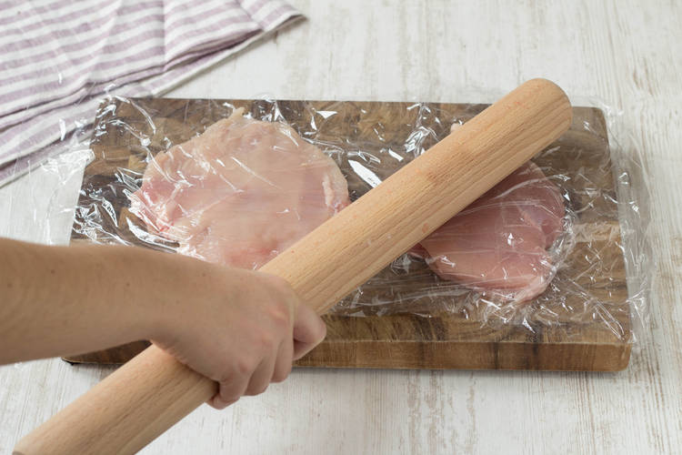 Add salt to the ingredients in the pan