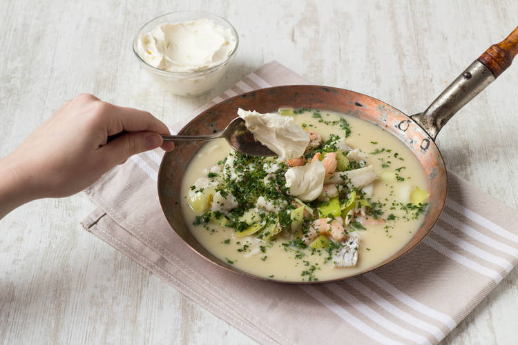 Add fish, leeks, and parseley to stock