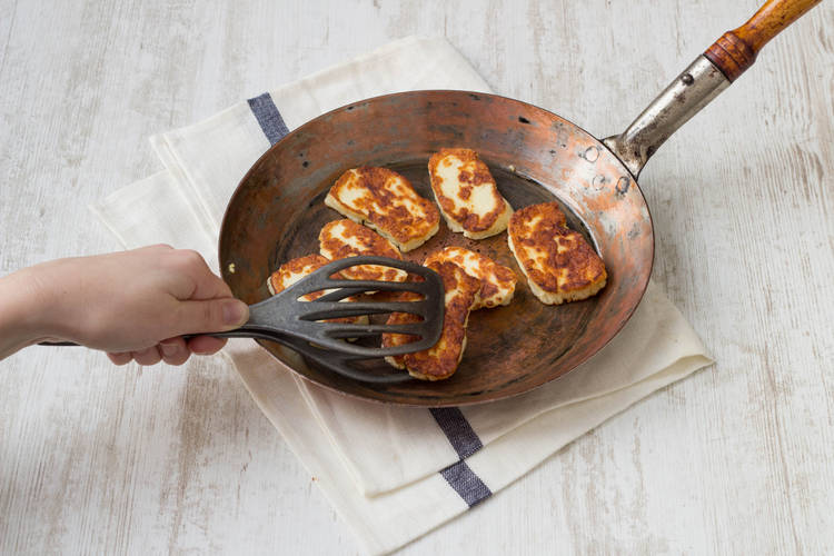 Fry the halloumi until golden