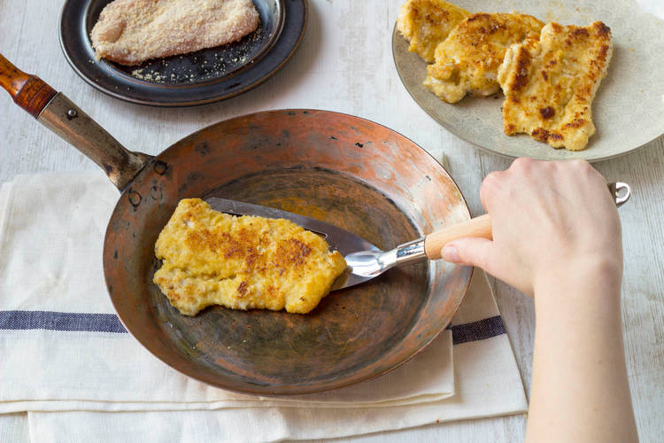 Cook the chicken breasts until the breadcrumbs are golden