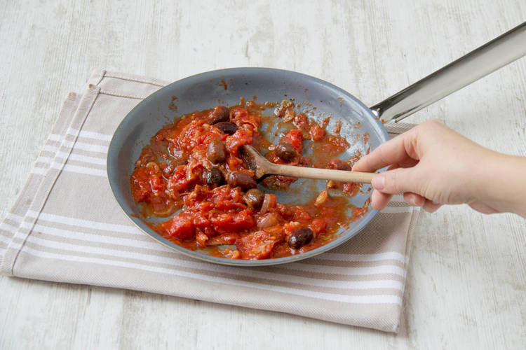 Add tomatoes and olives