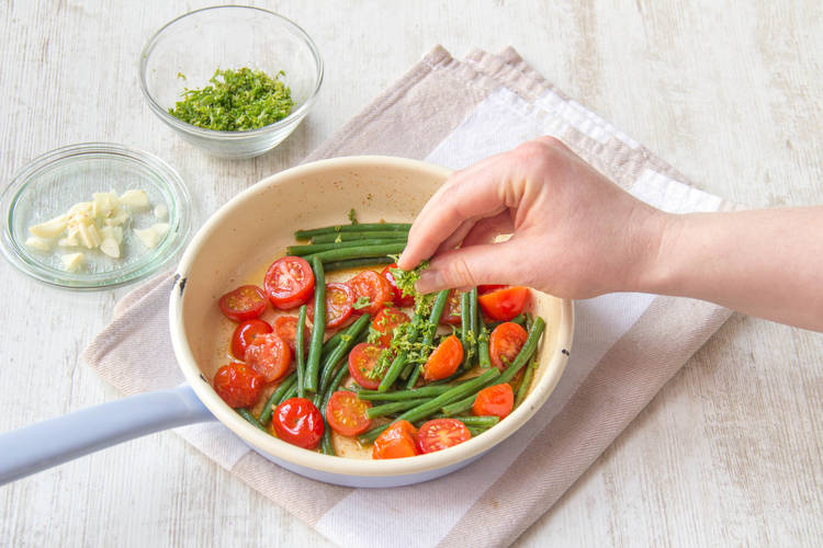 Cook the tomatoes and green beans