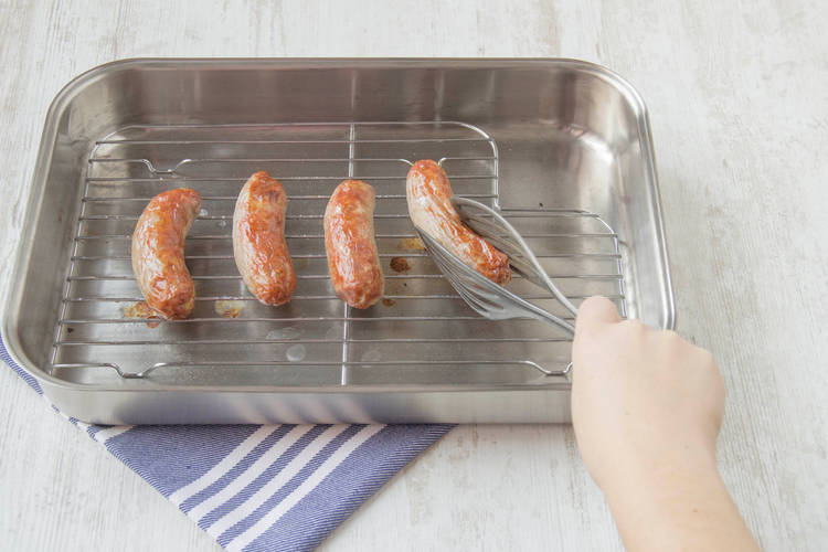 Cook the sausages on the grill