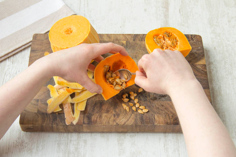 Remove seeds with a spoon