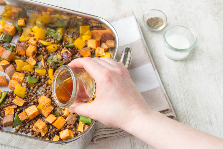 Add the red wine vinegar to the roasting tray
