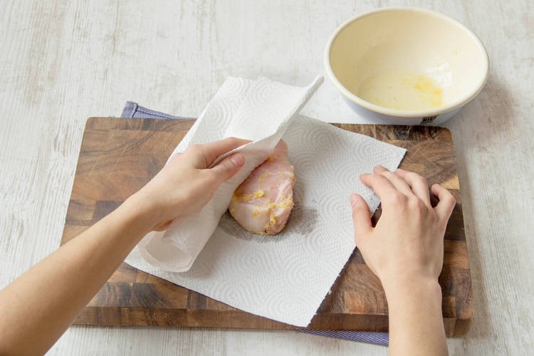 Remove pork from marinade