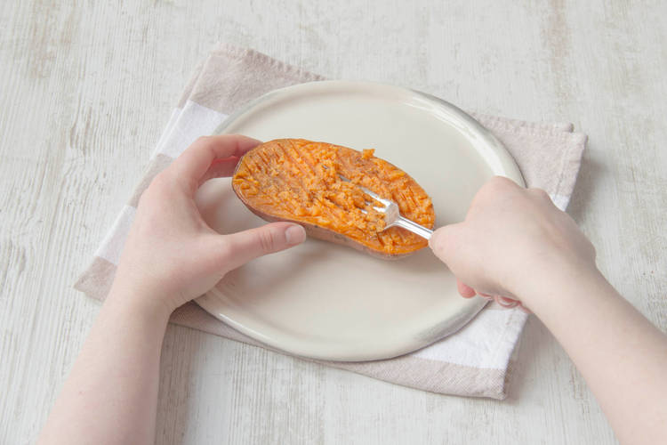 Lightly mash the sweet potato
