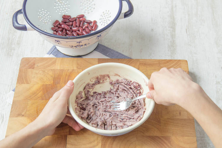 Thoroughly mash of the beans