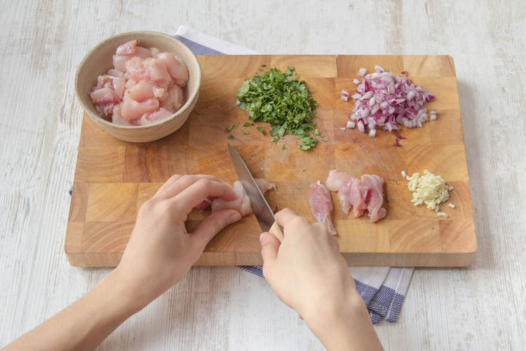 Chop your chicken thighs