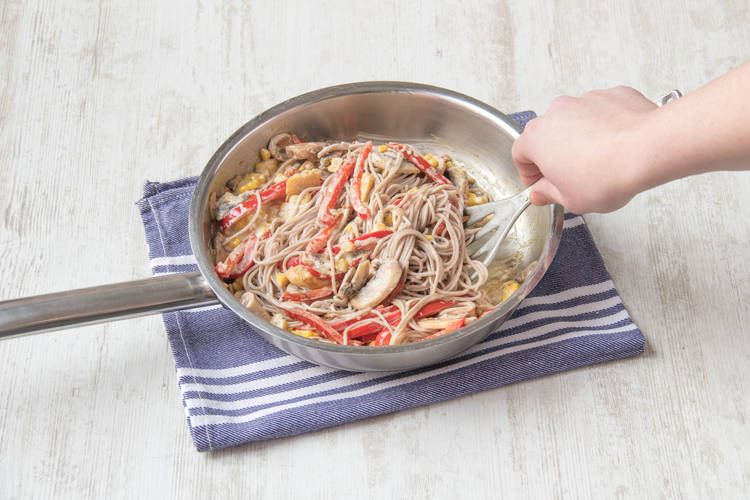 Add soba noodles to the pan
