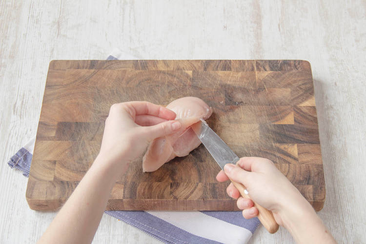Cut and stuff the chicken breasts