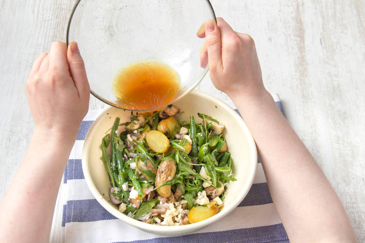 Salad with dressing in a large bowl