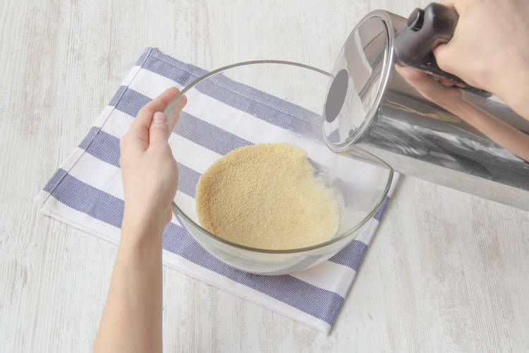 Place couscous in a bowl
